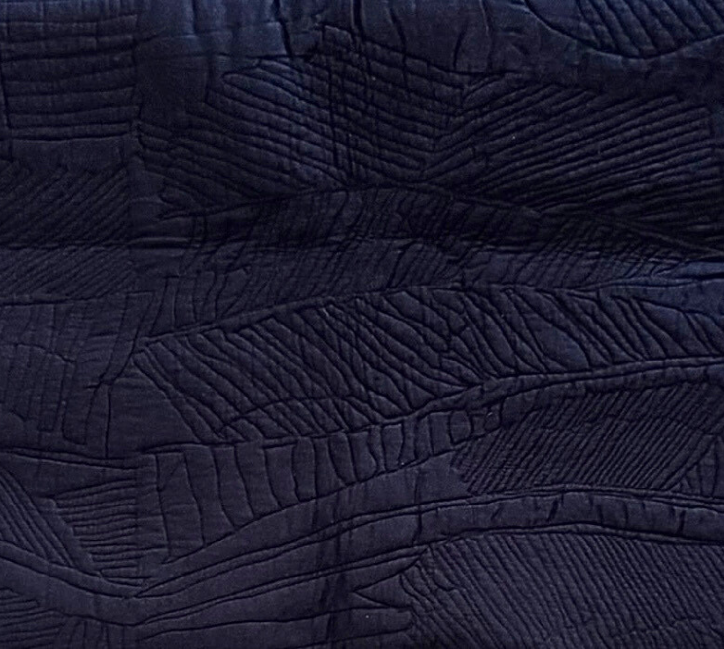 The Nocturnal dense quilted bed runner