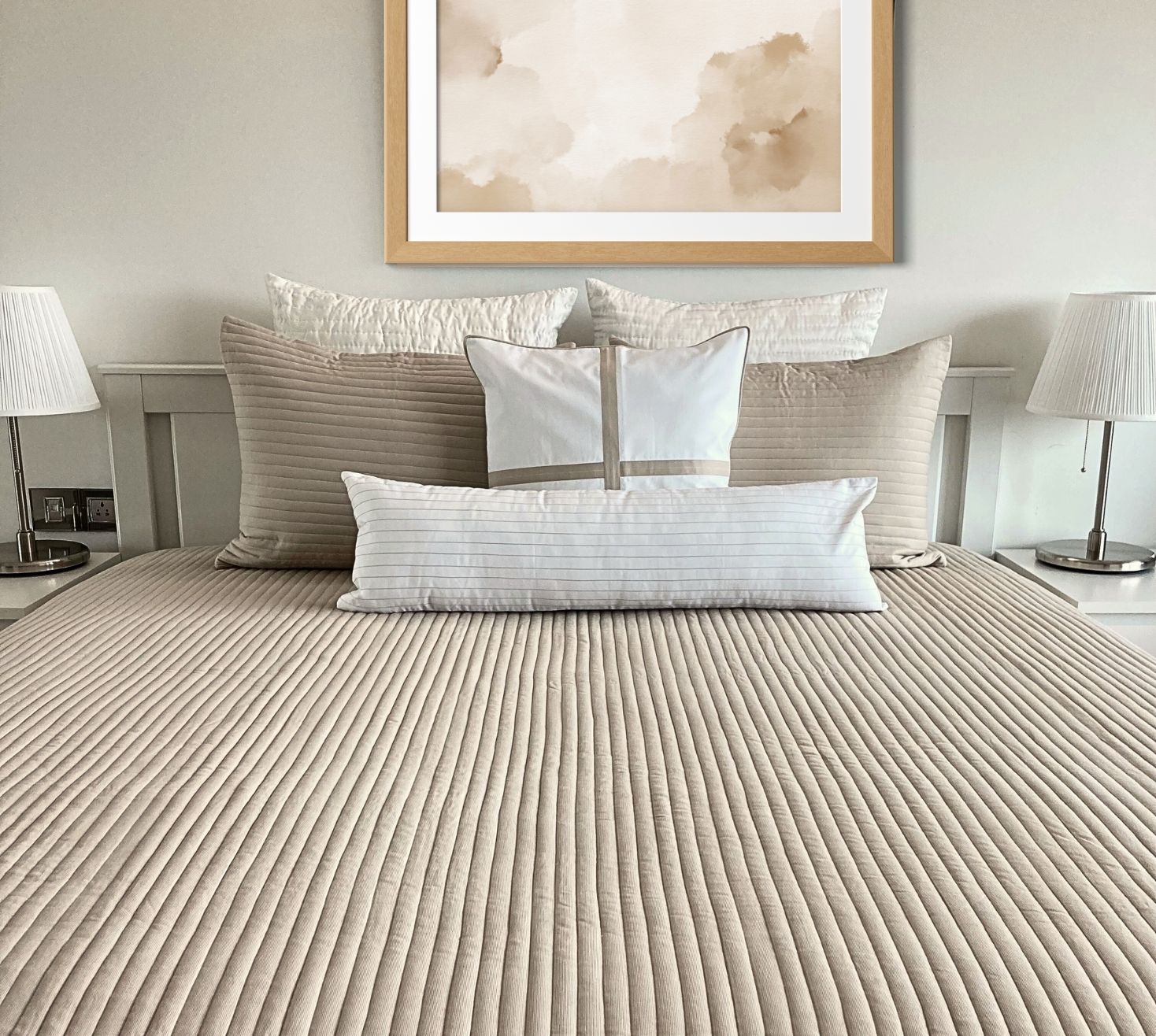 Channel style quilted white and beige patterned bedspread