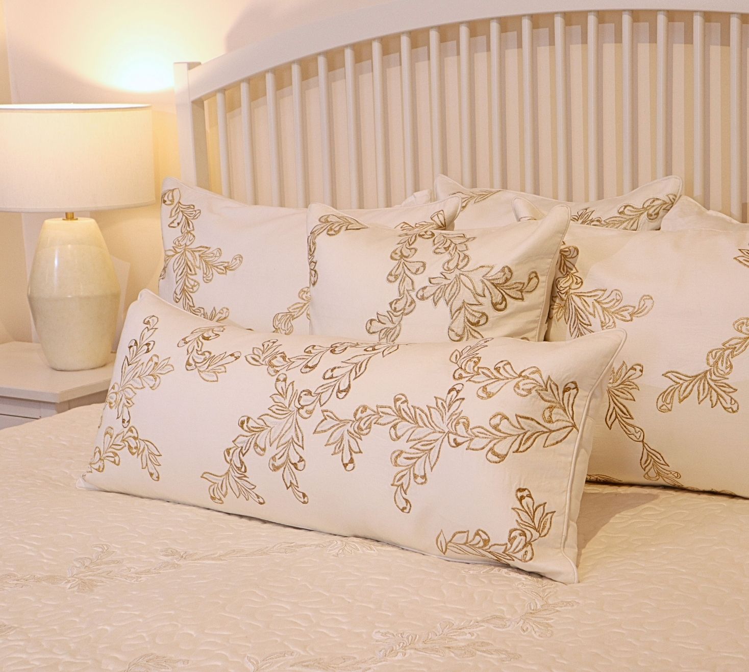 Neo classical petal gold embroidered quilted bedspread