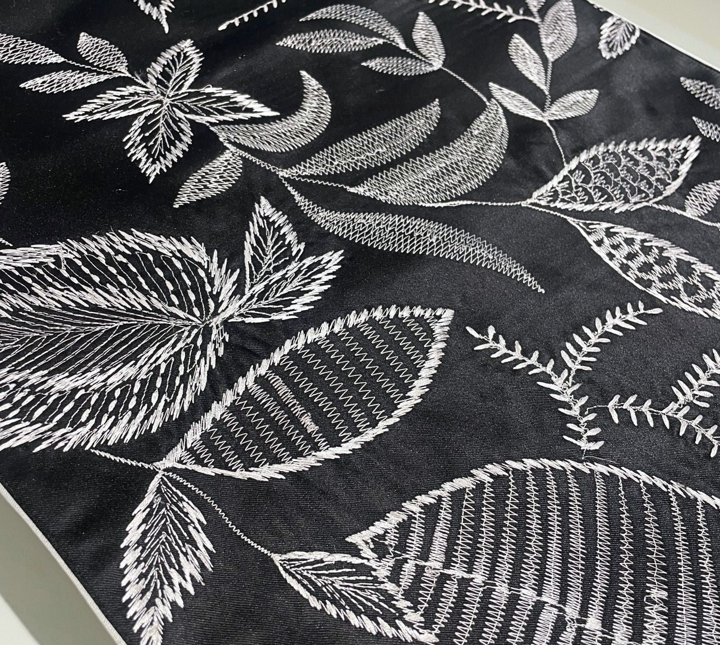Monochromatic leafy embroidered Table Runner