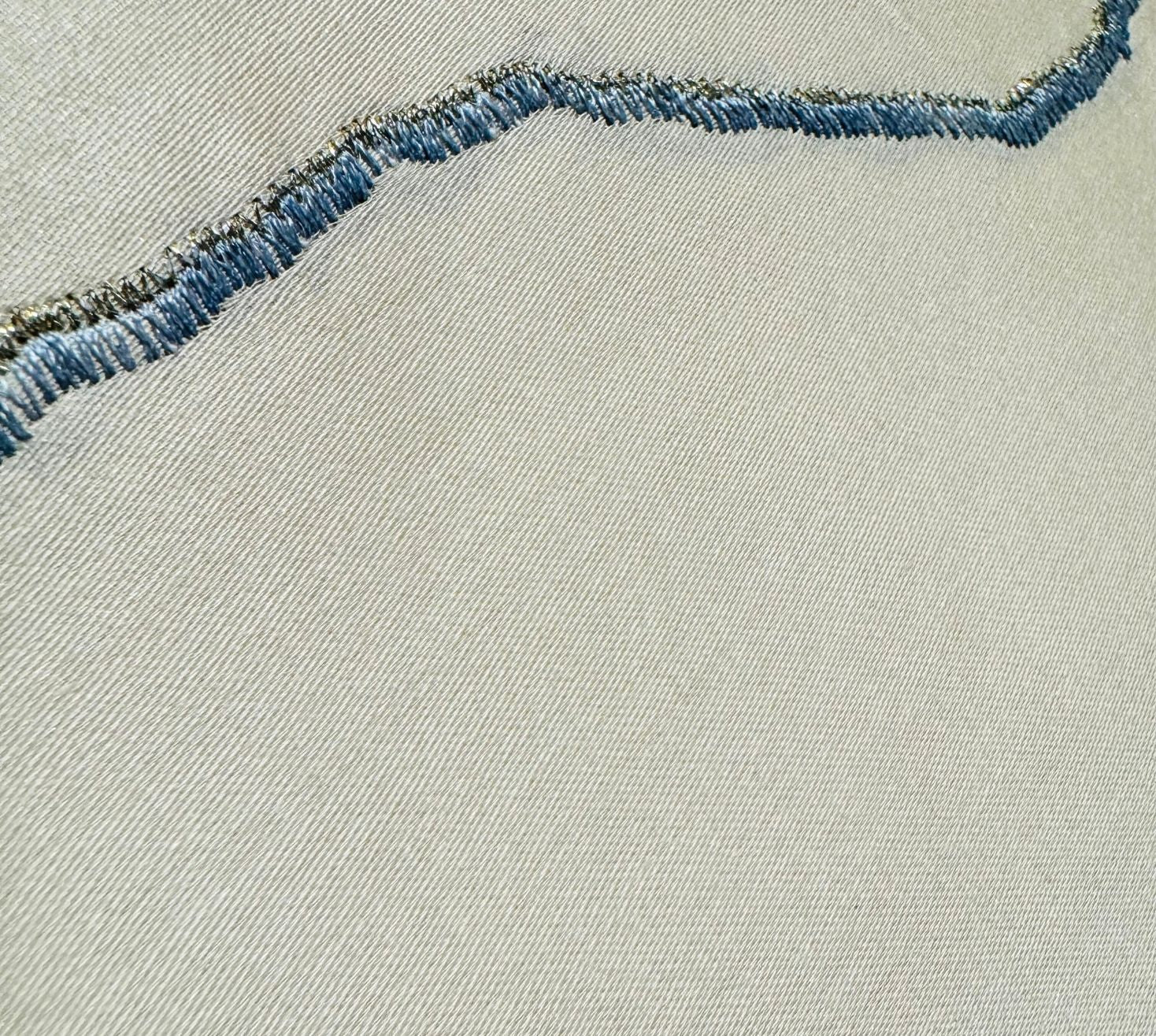 Gentle wave embroidered placemats